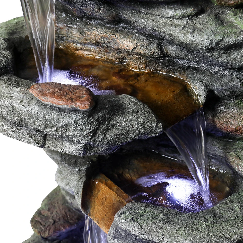 be the fountain not the drain - happy homeowner beside new garden fountain